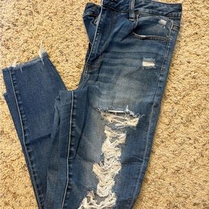 AE Next level stretch skinny distressed jeans